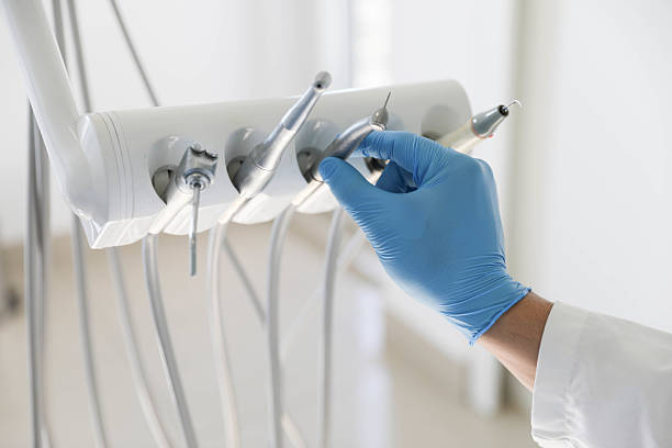 Professional Emergency Dentist technician working in Mason City, IA